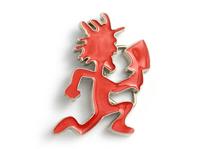 Red Kokopelli figurine belt buckle on a white background
