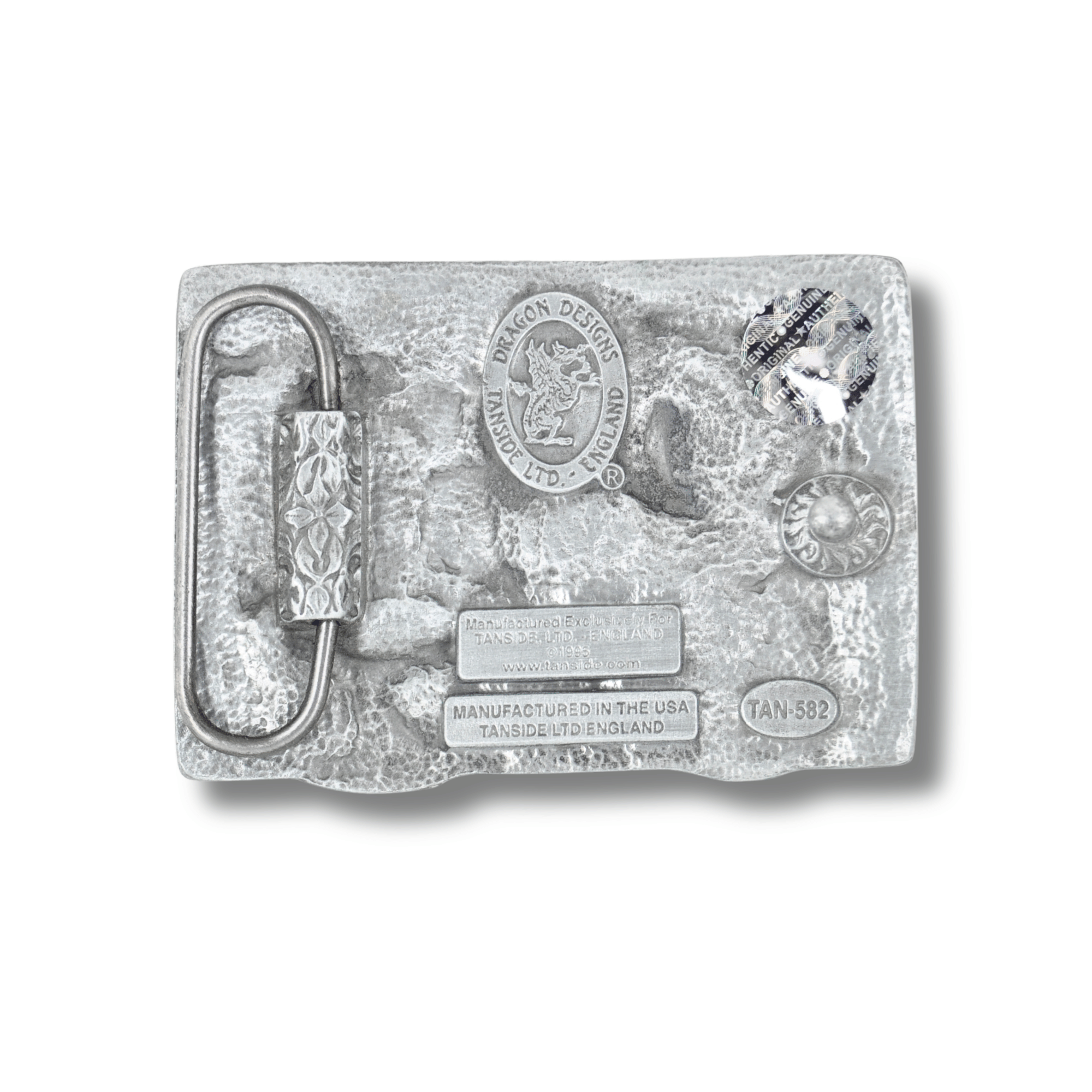 Silver belt buckle with detailed design on a white background