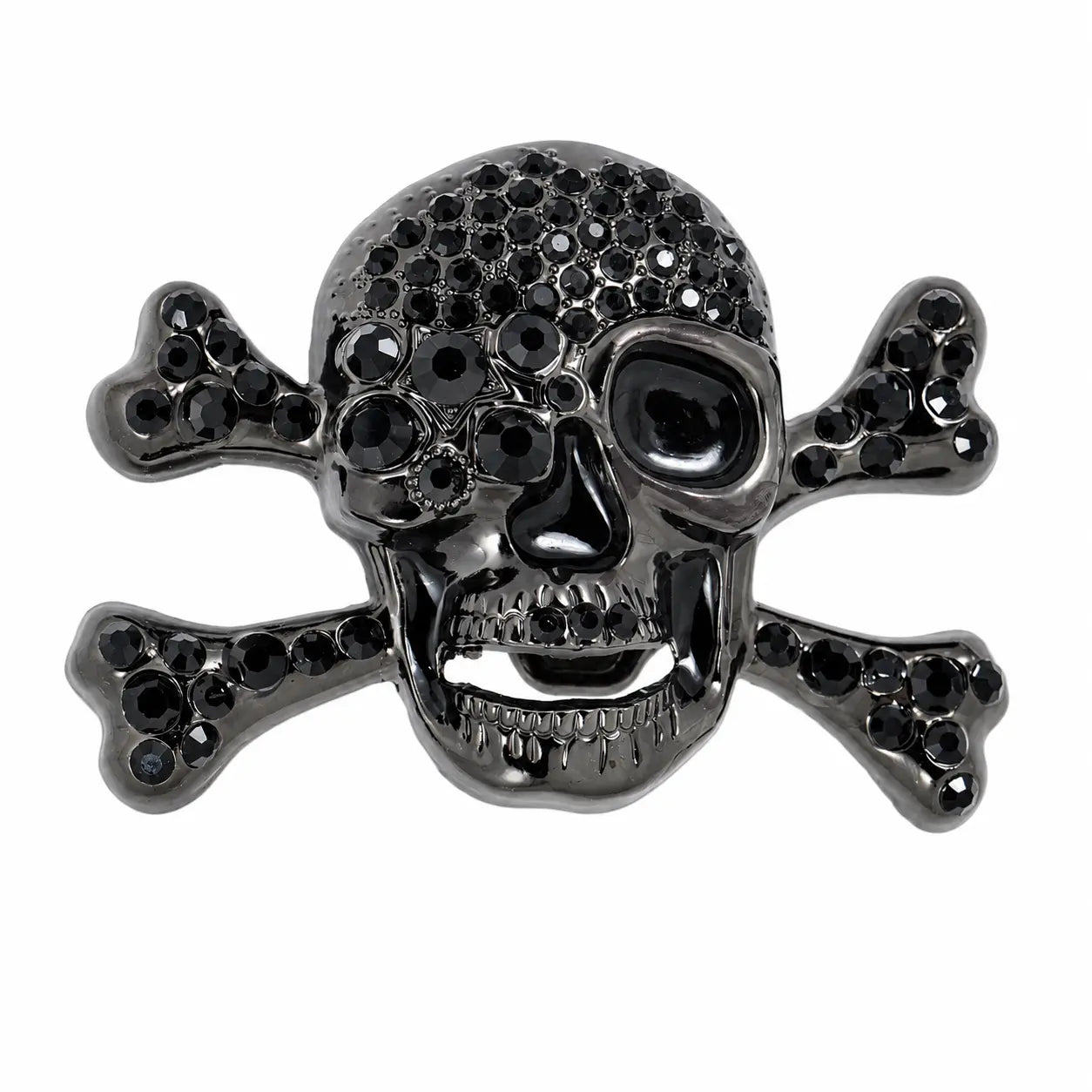 Black skull and crossbones belt buckle with embedded stones on a white background