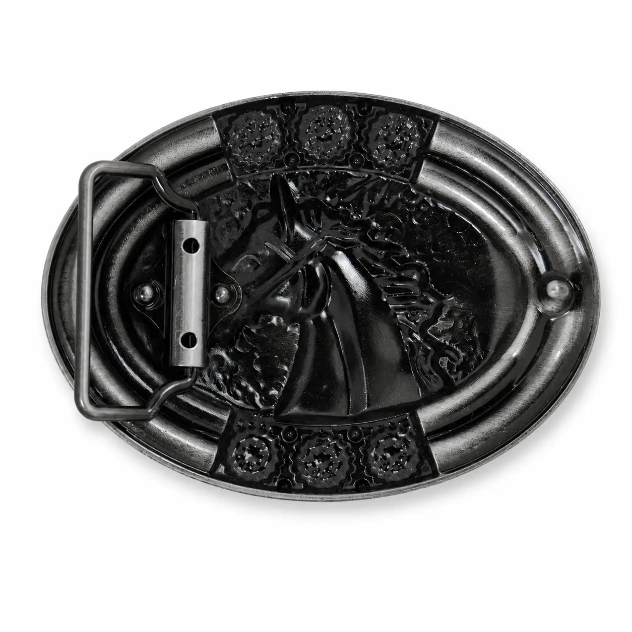 Rear of an oval black metal belt buckle featuring a raised embossed design of a horse head, with decorative floral details at the corners and a rectangular metal keeper loop on the left side, shown on a plain white background.