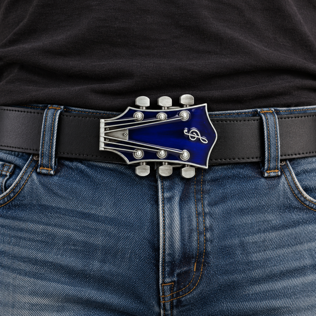 Deep blue guitar headstock buckle worn with black 38 mm leather belt