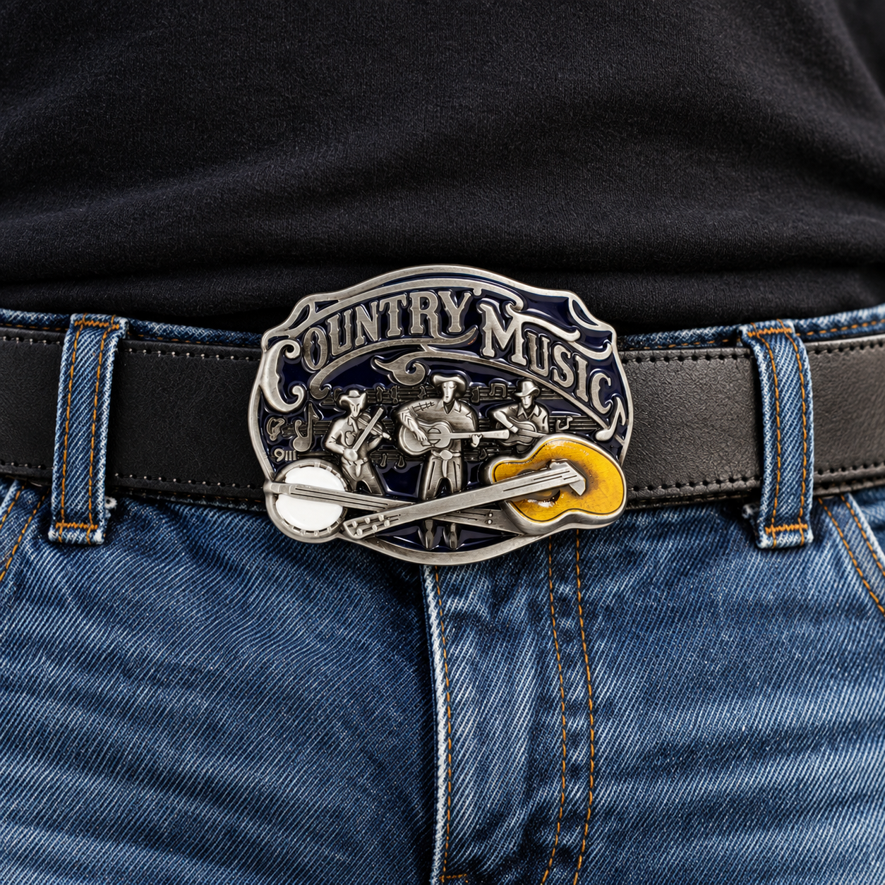 Country Music belt buckle worn with a black 38 mm leather belt