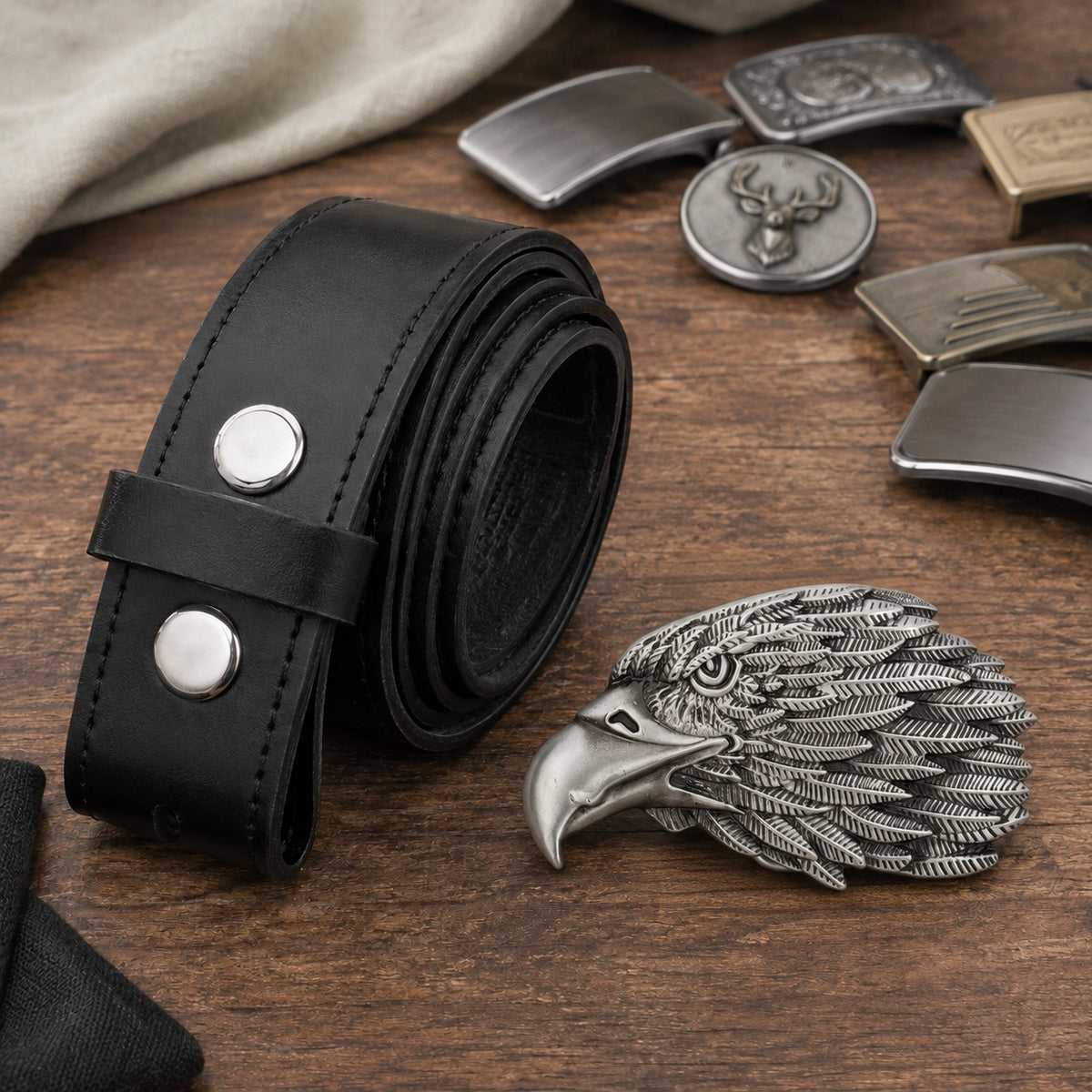 Eagle Head Belt Buckle with rolled black 38 mm leather belt - flat lay