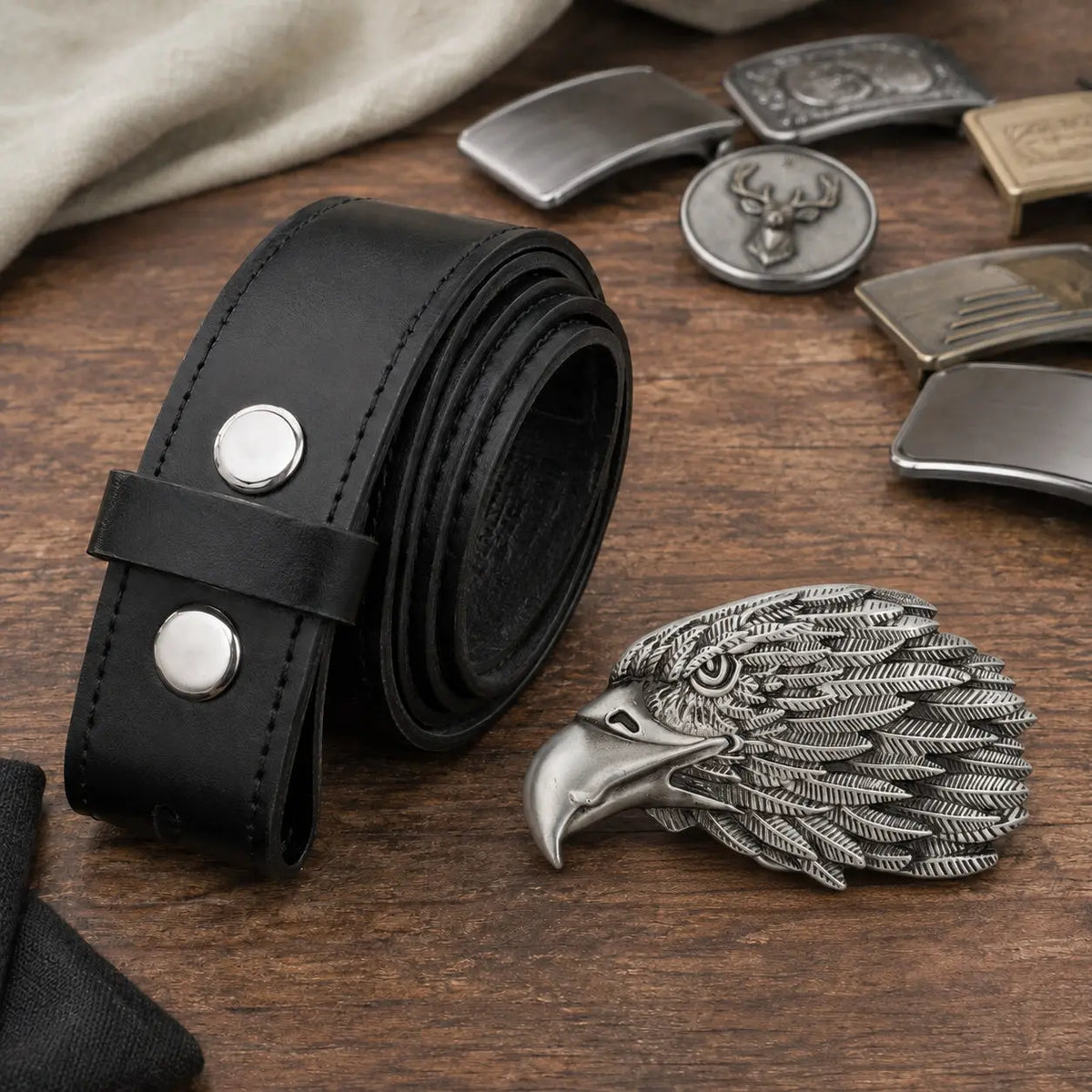 Eagle Head Belt Buckle with rolled black 38 mm leather belt - flat lay