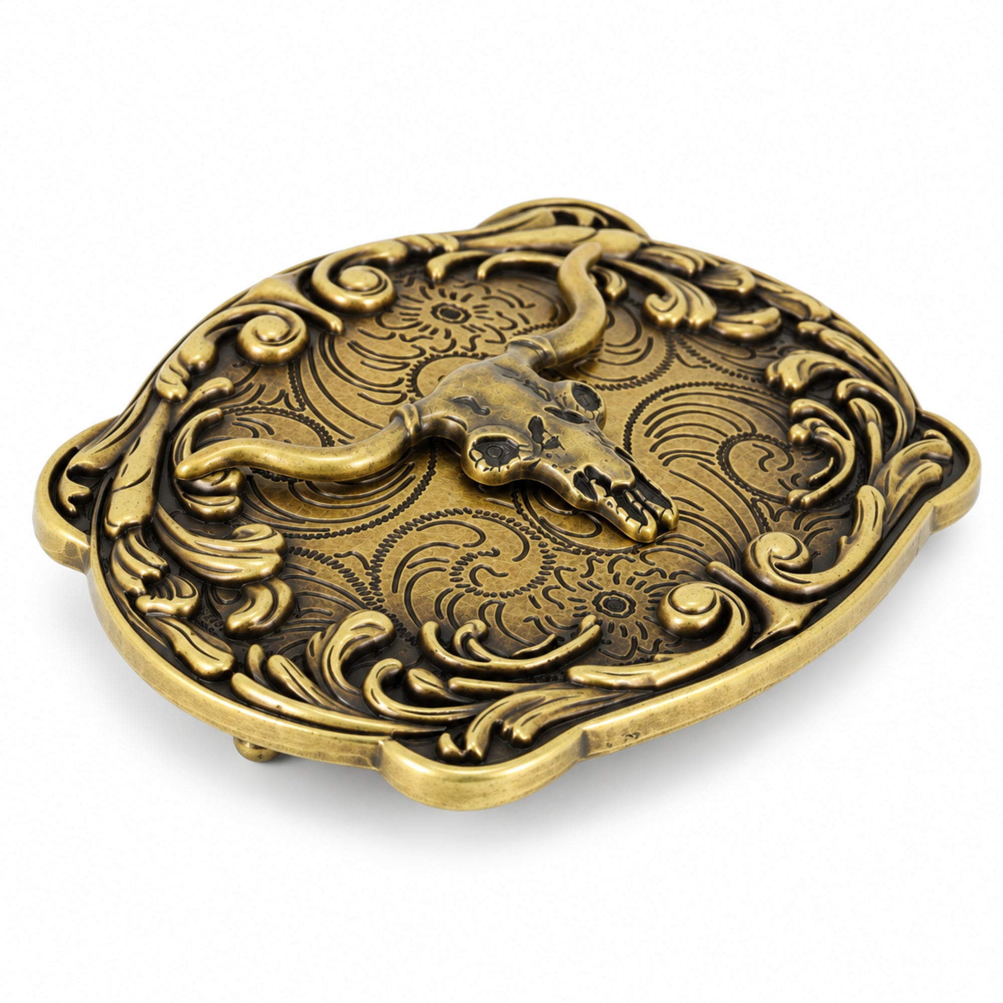 Angled view of longhorn skull belt buckle showing raised metal detailing