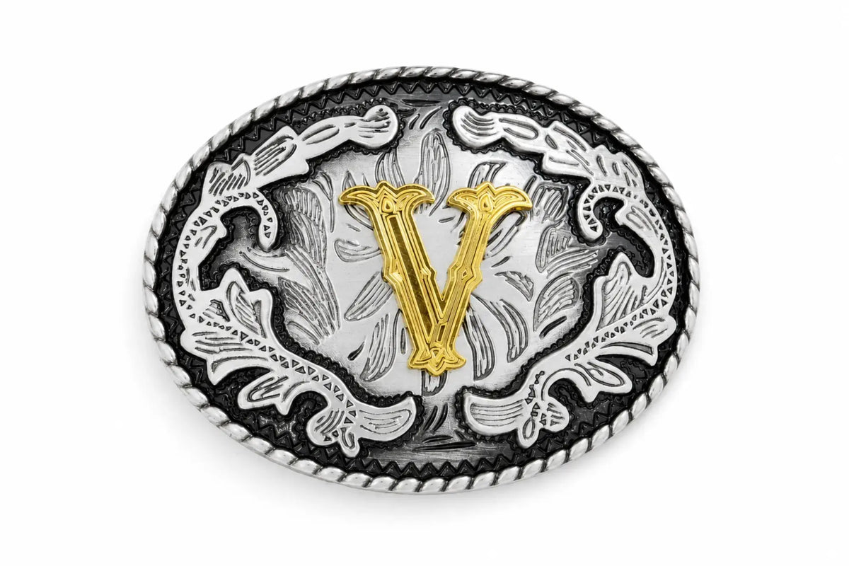 Belt buckle with decorative design and letter 'V' on a white background