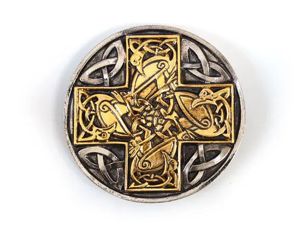 Celtic cross belt buckle with intricate patterns in gold and silver on a white background