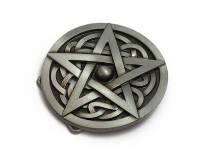 Metallic pentagram belt buckle with intricate designs on a white background