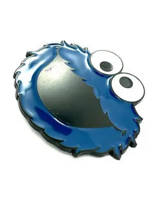 Angle View Blue elmo character belt buckle with large eyes on a white background