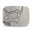 Silver cutaway skull belt buckle with dark recessed detailing