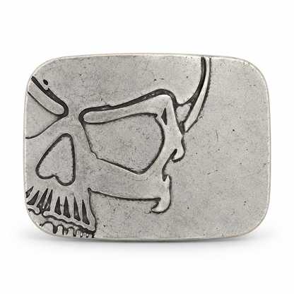 Silver cutaway skull belt buckle with dark recessed detailing