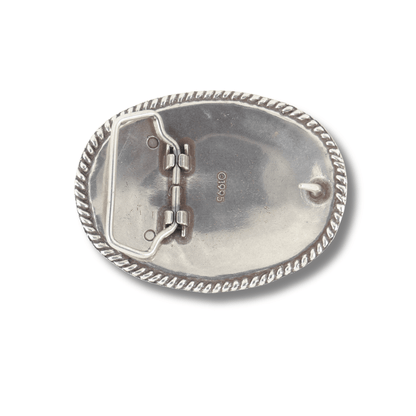 Silver belt buckle on a white background