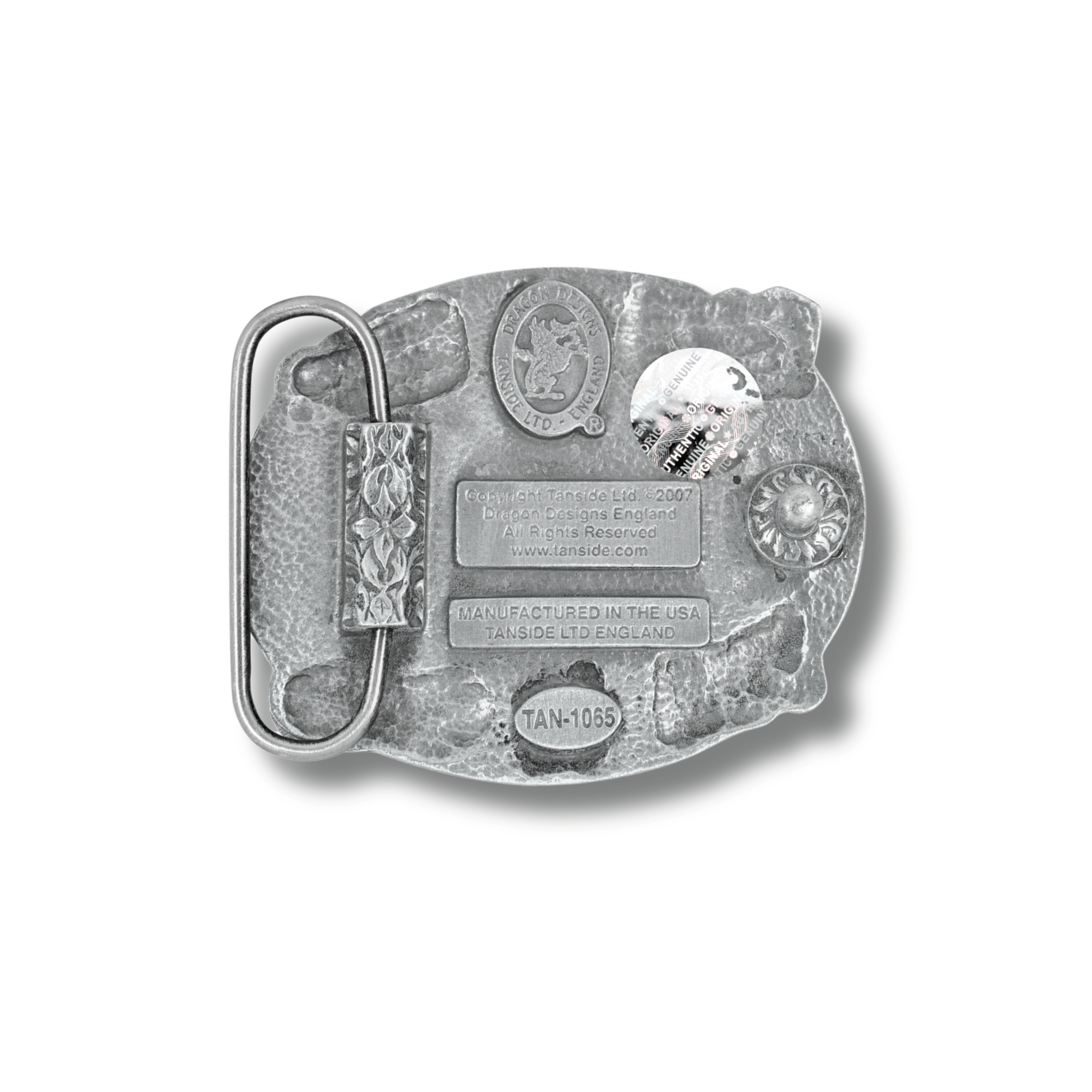Metallic belt buckle with engraved design on a white background