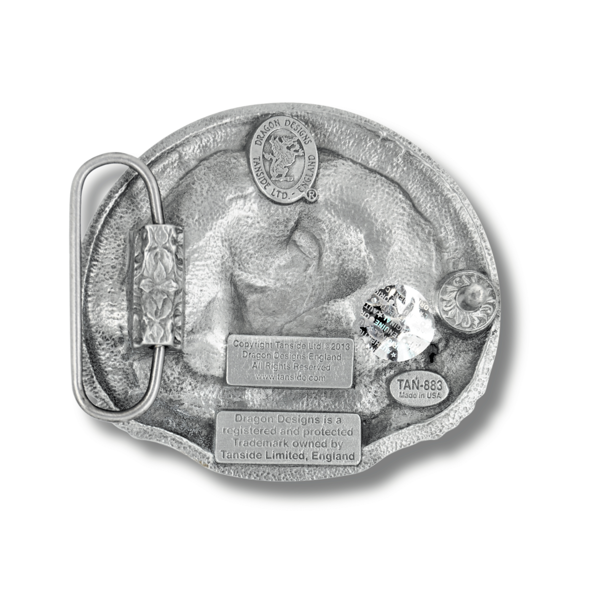 Metallic belt buckle with detailed design on a white background