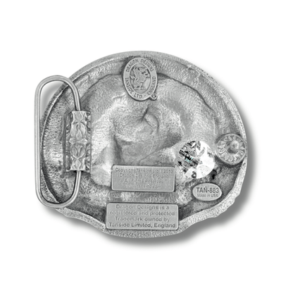 Metallic belt buckle with detailed design on a white background