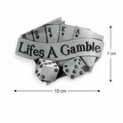 Silver belt buckle with size displayed with playing cards and dice, featuring 'Life's A Gamble' text on a white background.