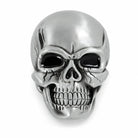 Silver skull-shaped BELT BUCKLE on a white background