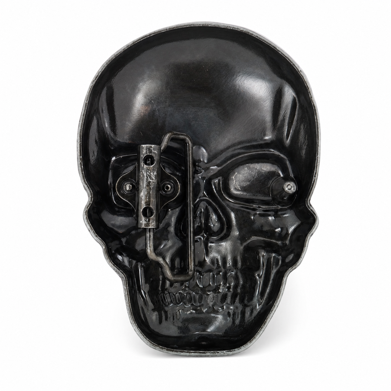 rear of a  skull-shaped belt buckle with belt clasp on a white background