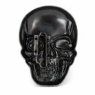 rear of a  skull-shaped belt buckle with belt clasp on a white background