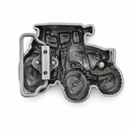 Rear of tractor belt buckle with a white background