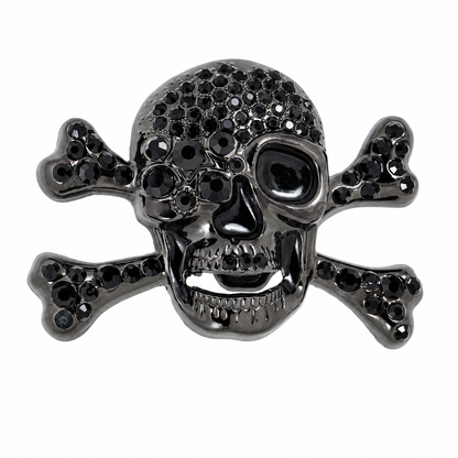 Black skull and crossbones belt buckle with embedded stones on a white background