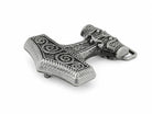 Anchor belt buckle with intricate designs on a white background