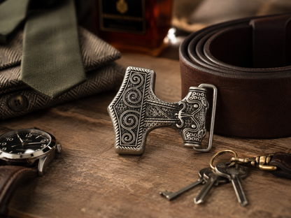 Anchor Belt buckle on a dressing table with belt and accessories.