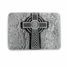 Metallic Celtic cross belt buckle on a textured stone-like background