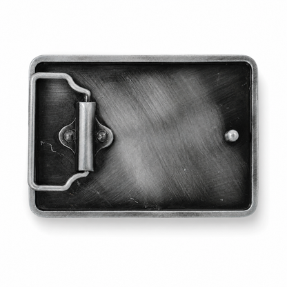 rear of Belt buckle with a metallic finish on a white background