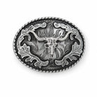 An oval silver-toned metal belt buckle featuring a detailed western design with a central longhorn skull, floral scrollwork, and a textured beaded border, shown on a plain white background.