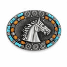 An oval silver-toned belt buckle featuring a raised horse head motif in the center, surrounded by turquoise and orange stone accents on a white background.