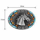 Oval western-style belt buckle with a silver-toned horse head motif, turquoise blue stones, and amber accents, shown with dimension markings of 10 cm width and 7.5 cm height on a white background.