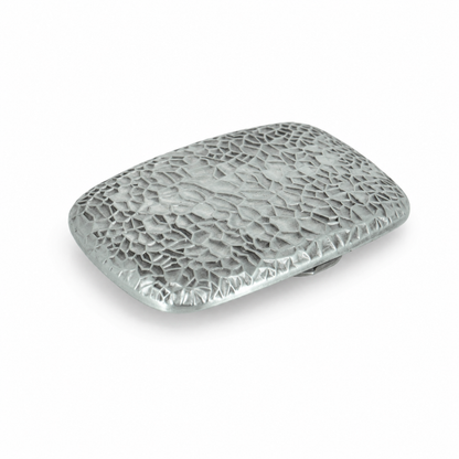 A silver-toned metal belt buckle with a textured, hammered surface and rounded rectangular shape, shown on a plain white background.