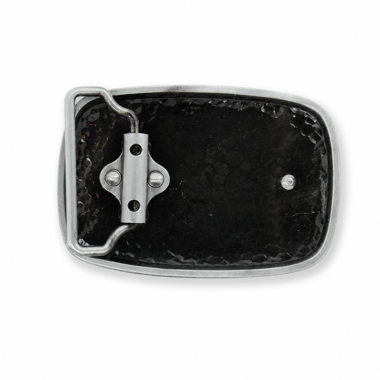 A close-up of the rear belt buckle with a textured black insert and a silver-toned metal frame and latch mechanism, shown on a plain white background.