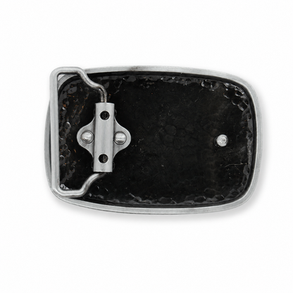 A close-up of the rear belt buckle with a textured black insert and a silver-toned metal frame and latch mechanism, shown on a plain white background.