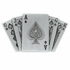A set of five rectangular metal cards BELT BUCKLE shaped like playing cards, fanned out to show the backs and faces. The center card is an Ace of Spades with a brushed silver finish and engraved spade details, while the other cards show black spade symbols and suit markings on a white background.