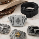 Playing cards belt buckle on a dressing table with belt and accessories.