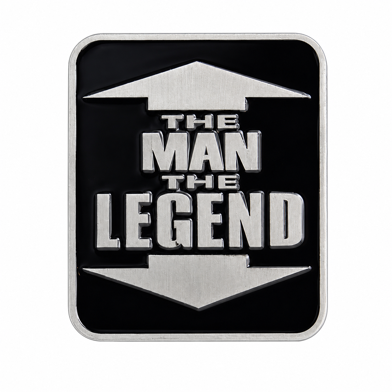 A rectangular black belt buckle with rounded corners, featuring a brushed silver metallic border and a matching silver arrow design pointing up and down, with the text 'THE MAN THE LEGEND' in silver block letters in the center.