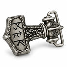 Angled view of silver Viking hammer belt buckle with raised decorative detailing