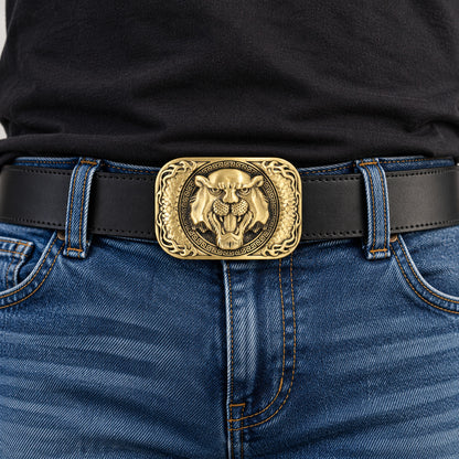 Antique gold tiger head belt buckle worn on a black mans leather belt