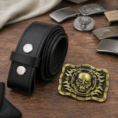 Bronze/gold skull and flames buckle beside a black leather belt