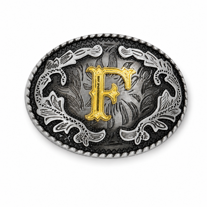 Decorative belt buckle with a gold 'F' and intricate silver design on a white background