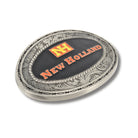 belt buckle with New Holland logo on a black background