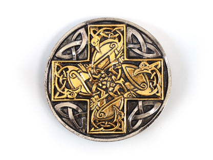 Celtic cross belt buckle with intricate patterns in gold and silver on a white background