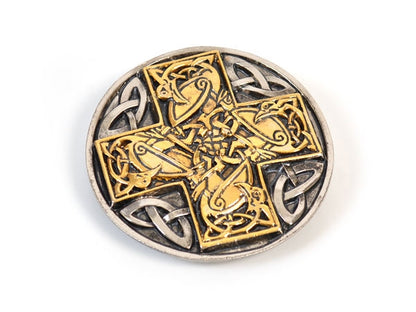 Close-up at an angle of a celtic cross buckle.