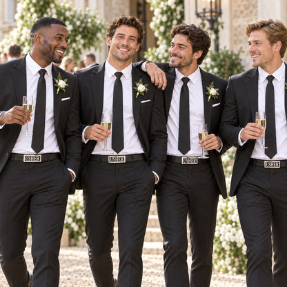 Wedding party ushers wearing matching personalised USHER belt buckles at a formal wedding